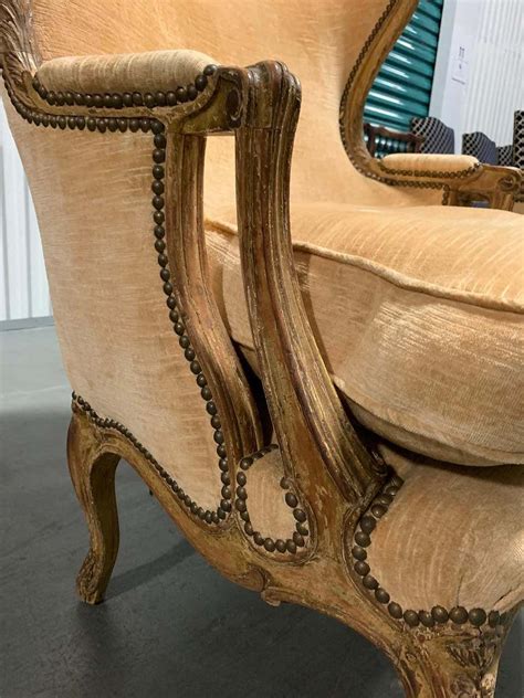 Pair Of 19th Century Large French Upholstered Bergere Oreilles