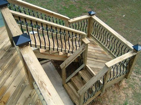 But stepping off the bottom step (or preparing to step up on it) is actually when someone is the most off balance and likely to fall. deck stairs with landing design | by Distinctive Designs 4 ...