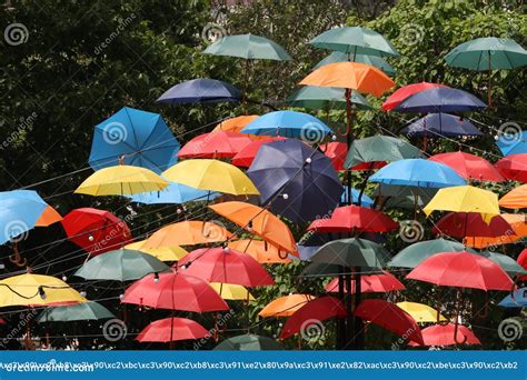 Colorful Umbrellas Flying In The Summer Blue Sky Editorial Photography