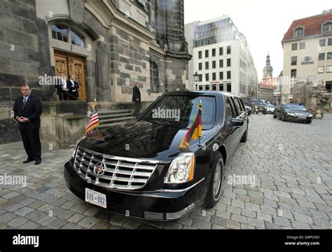 The Armoured Limousine Of Us President Barack Obama Stands In Front Of
