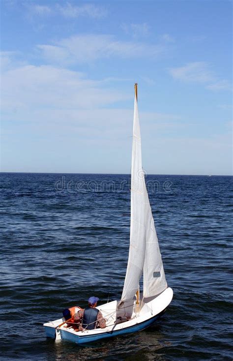 Small Sailboat A Small Yacht Under Full Sail On Lake Michigan