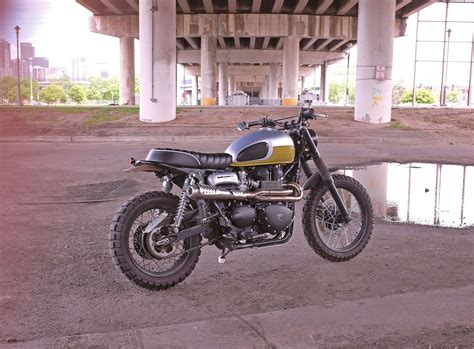 Below is the information on the 2014 triumph scrambler. 2014 Custom Triumph Scrambler - Custom Vintage Looking Seat