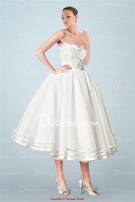 Elaborate Ball Gown Tea Length Wedding Dress Featuring Appliqued Bodice