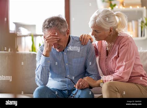 Husband Comforting Wife Hi Res Stock Photography And Images Alamy