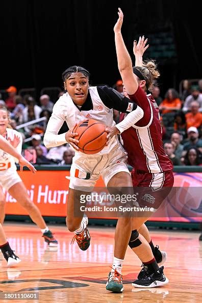 Miami Guard Lemyah Hylton Attempts To Drive To The Basket While News