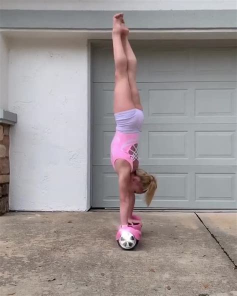 Girl Does Amazing Handstand While Rotating Legs On Cliff Jukin Media Inc