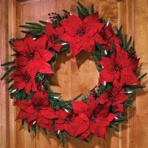 The Cordless Prelit Poinsettia Wreath Hammacher Schlemmer Eeyore