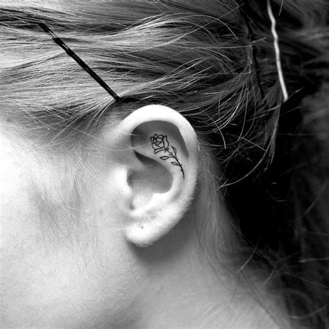 Consider getting some type of vine or wire pattern to compliment the shape of the ear itself.; Minimalist Ear Tattoo Trend has People Getting Tiny ...