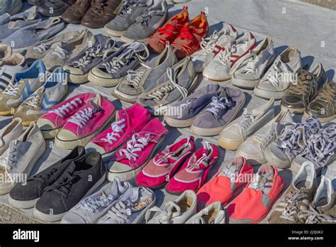 Second Hand Sneakers Footwear At Flea Market Stock Photo Alamy