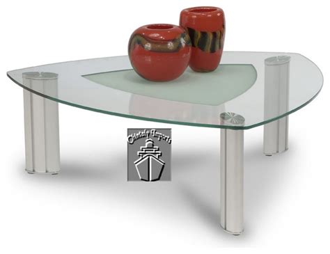 The glass table top is much heavier than we anticipated, so moving it from our primary home to our beach house was a challenge. Tracy Triangle Shape Glass Cocktail Table With Frosted ...