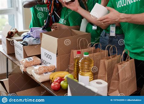 Donations Food With Canned Food On Wooden Table Background Pasta