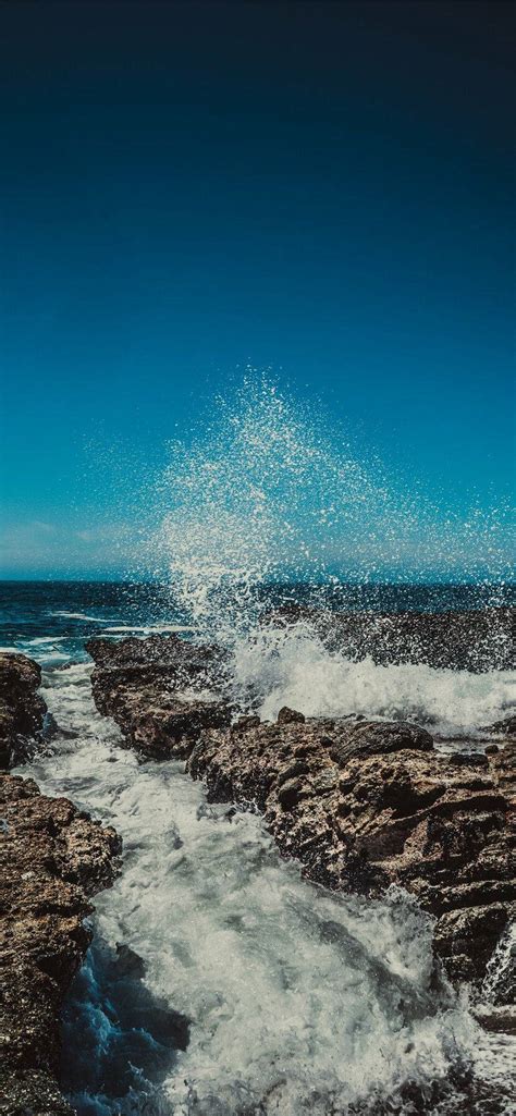 Download Iphone 4k Beach Waves Crashing Rocks Wallpaper