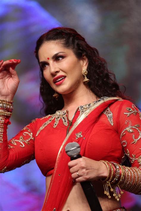 Sunny Leone Looks Super Sexy In A Red Revealing Dress At Telugu Film â€œrogueâ€ Audio Launch