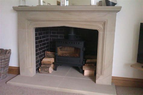 Because each stone we make is cut to order, we are able to dress and carve. Stone Fireplace Surround Images : Corinthian Stone ...
