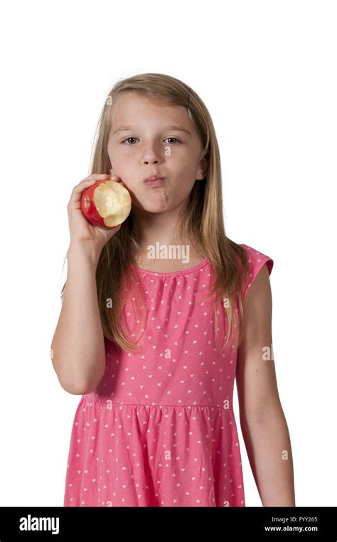 Little Girl Eating An Apple Stock Photo Alamy