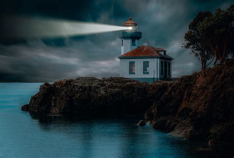 Lighthouse Coast Glow Rocks Night Hd Wallpaper Peakpx