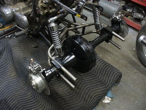 Trike rear end widths are measured from outside of wheel mounting flange to outside of wheel mounting flange. Honda trike rear end