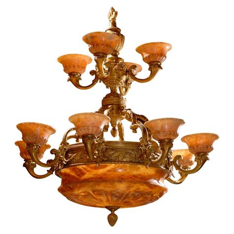 Alabaster is a mineral or rock that is soft, often used for carving, and is processed for plaster powder. Fine gilt bronze and alabaster, french chandelier with two ...