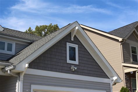 Norandex sterling deluxe vinyl siding offers a lightly embossed woodgrain pattern that mirrors the look of hand cut wood cladding. Vinyl Sterling Gray Siding | Olivette, MO (63132) | Siding ...