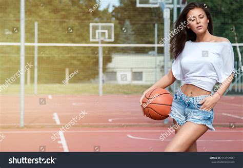 Beautiful Sexy Girl On Basketball Ground Stock Photo Edit Now