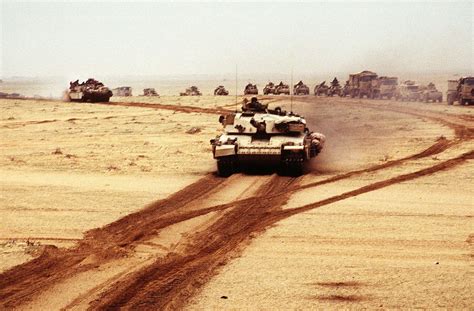 A British Challenger 1 Main Battle Tank Moves Along With Other Allied