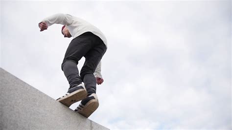 Slow Motion Acrobatic Parkour Teenager Doing Backflip Stock Video Footage SBV