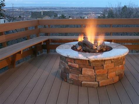 We can totally see ourselves roasting marshmallows on the open flame of these bad boys. Modern patio decorating - awesome DIY propane fire pit ideas
