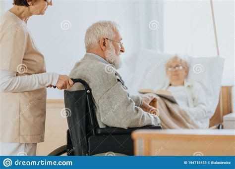 Senior Man After Stroke Sits In A Wheelchair Stock Image Image Of