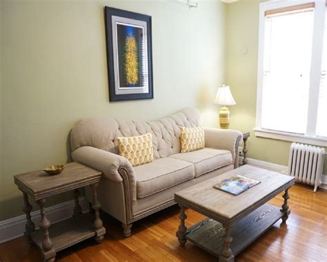 A studio typically consists of one bathroom and a main room that serves as the living room, bedroom and kitchen. 205 living room - Princess Anne Hotel