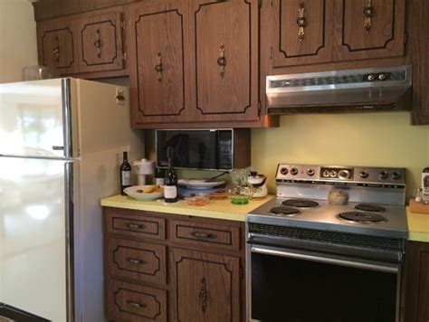 Wood laminate used for refacing kitchen cabinets is a very thin layer that's applied to make it seem that the cabinets are made entirely of wood. How To Resurface Laminate Cabinets | online information