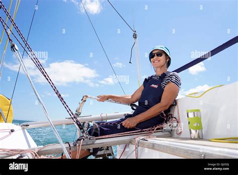 Woman Helming Sailing Boat Stock Photo Alamy