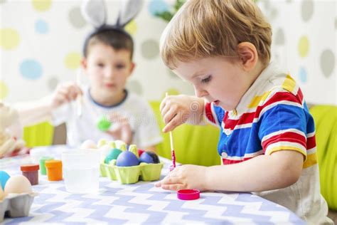 Happy Easter Children Dye Colorful Egg For Easter Hunt Stock Photo