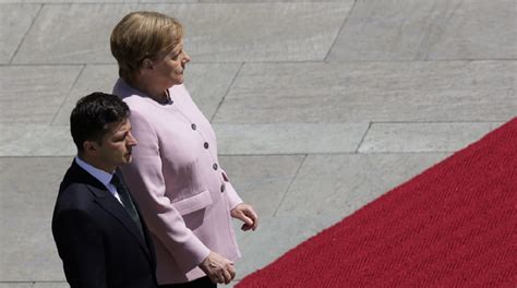 Germanys Merkel Says Shes Ok After Shaking At Ceremony