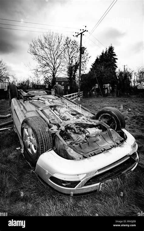 Car Crash And Car Damage Vehicle In A Field After High Speed Crash