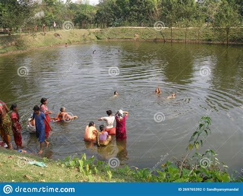 Rural Indian Village Landscape In Jangipur Murshidabad Women Are Swimming And Taking A Bath In