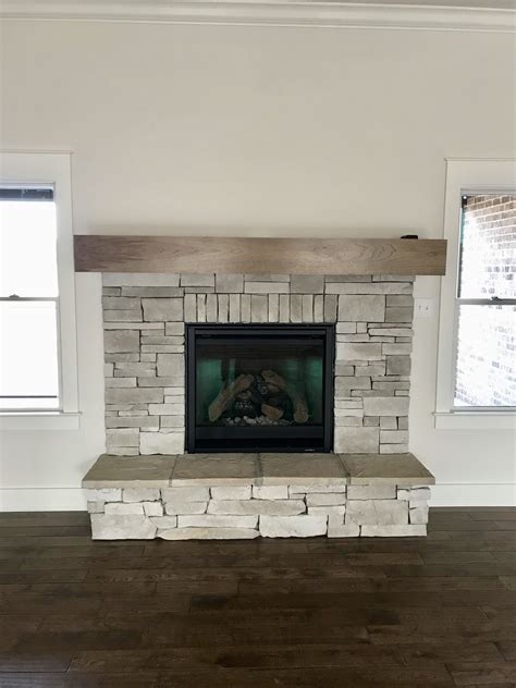 American woodmark charlottesville 14 9/16 x 14 1/2 in. Stone Fireplace | Stone fireplace, Fireplace, Simply white