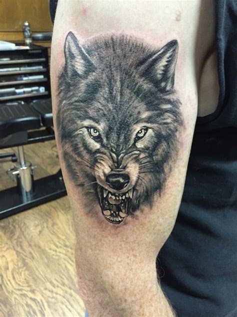 Black And Gray Wolf Tattoo By Capone Tattoos