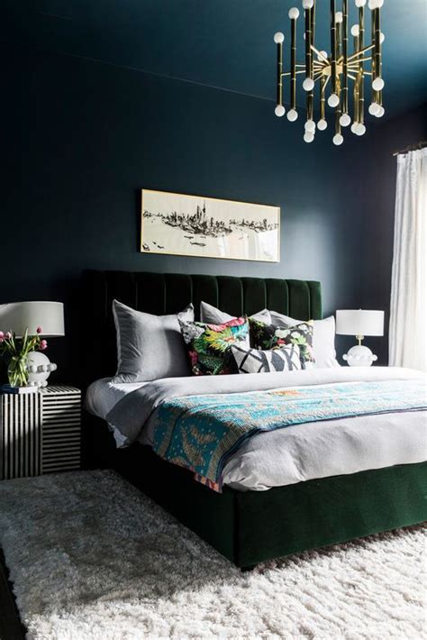 A Moody Bedroom With Navy Walls And A Ceiling A Dark Green Velvet Bed