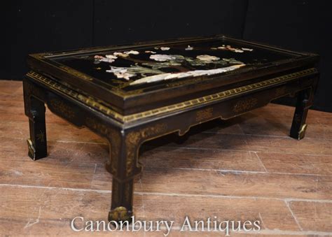 The collection also includes beautifully carved desks, writing tables, and scholar's tables. Antique Chinese Coffee Table - Black Lacquer 1920