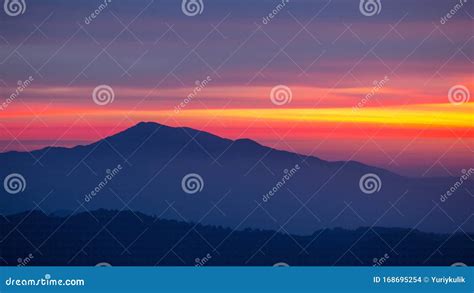 Mountain Ridge Silhouette At The Dramatic Twilight Stock Photo Image