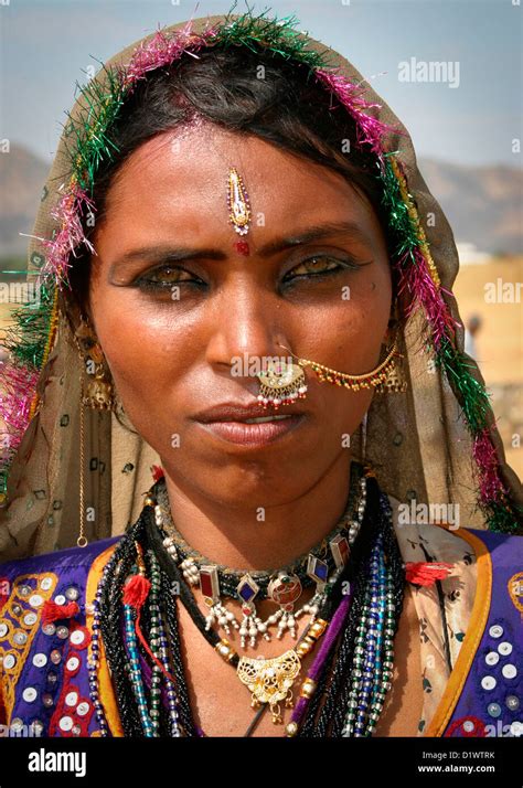 Portrait Of A Beautiful Rajasthani Woman Wearing Traditional Colourful