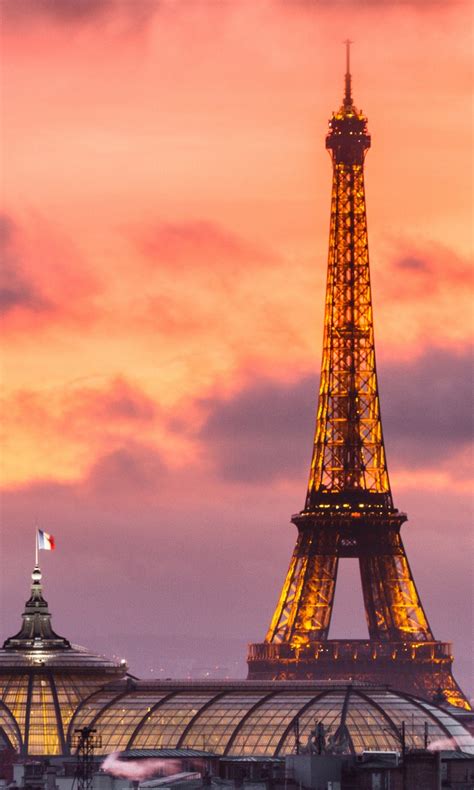 Paris Eiffel Tower With Purple Sky And Clouds Background During Sunset