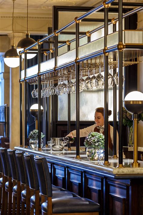 11 The Bar Has Bespoke Black Metal And Brass Gantries With Inset