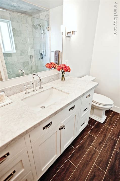 By kate riley • may 14, 2015. Honed Carrera Marble Countertops - Transitional - bathroom ...