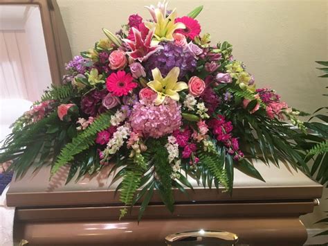 Same day or next day delivery is available. American Beauty Casket Flowers - Main Florist