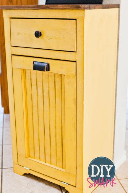 Tilt out trash cabinet can bin kitchen wooden trash can free standing holder recycling cabinet with hideaway drawer wooden removable bamboo cutting board trash holder (black). 12 Tilt Out Trash Cabinets To Stash Unsightly Garbage Can ...