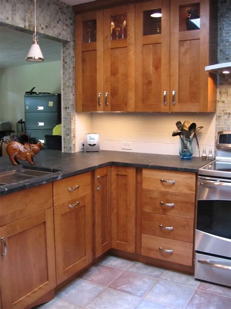You can use cherry wood for kitchen cabinets for kitchen dish racks. Prep area - soapstone, cherry, white and glass tile, glass ...
