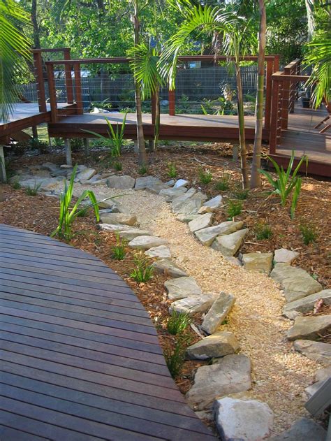 Raised beds are true decorations that add charming, simple and attractive designs to creative backyard landscaping ideas and turn gardens into lovely places for growing vegetables, edible herbs, berries or flowering plants. DIY Dry Creek Bed Ideas | Dry creek, Dry creek bed ...