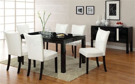 Go for a table with traditional details such as a turned leg paired with classic cross back chairs, or pick a modern set in durable bamboo and handwoven paper twine for a natural touch. CM3176BK-T Lamia I Black Dining Table w/Optional White Chairs