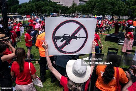 An Attendee Holds A Sign Calling For A Ban On Assault Weapons During News Photo Getty Images